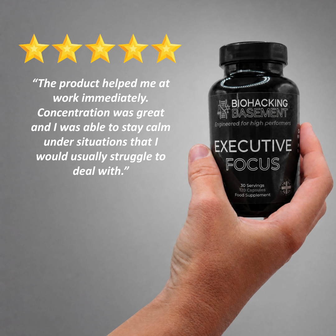 A hand holding a black bottle of Executive Focus dietary supplement, with a five-star graphic and a testimonial quote on a gray background.